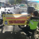 Poros Pagi Binmas Kelurahan Ngaglik Polsek Batu Kota Polres Batu Pasang Himbauan Tertib LaluLintas