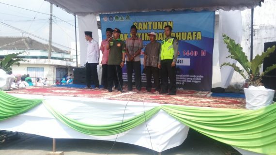 Bhabinkamtibmas Polsek Pujon Polres Batu Pengamanan Pawai Ta’aruf Memperingati tahun Baru Islam Di Desa Ngabab