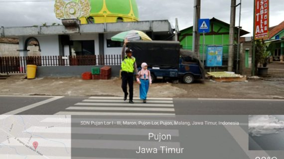 Perlancar Mitra Kerja di Masyarakat Binaannya, Polsek Pujon Polres Batu Poros Pagi Bantu Kelancaran Arus Lalin