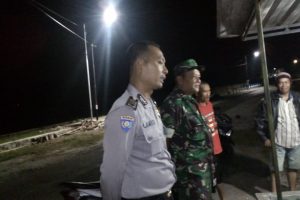 Bhabinkamtibms Polsek Pujon Polres Batu Menghadiri Giat Santunan dalam rangka kondusifkan wilayah