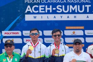 Denri Maulidzar Borong Tiga Emas Lewat Cabor Dayung Rowing di PON XXI Aceh Sumut